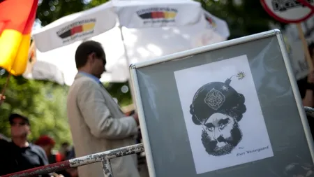 Caricatură cu Mahomed, afișată în fața unei moschei din Berlin