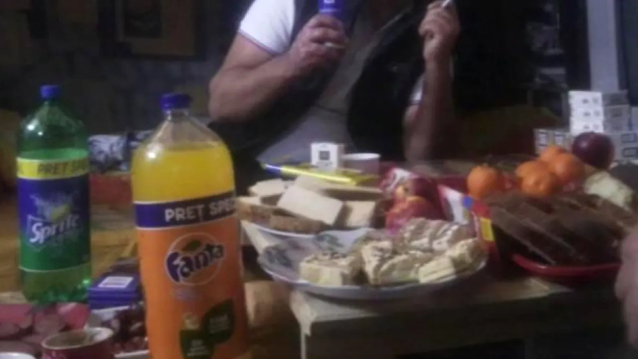 Anchetă la Penitenciarul Colibași după ce deținuții au postat pe Facebook fotografii de la masa de Revelion - GALERIE FOTO