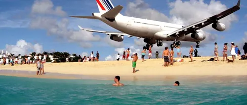 Locul în care avioanele aterizează peste capetele turiștilor afați la plajă