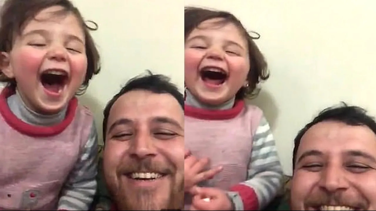 Viața bate filmul. Un tată din Siria își învață fetița să râdă atunci când cad bombe (VIDEO)