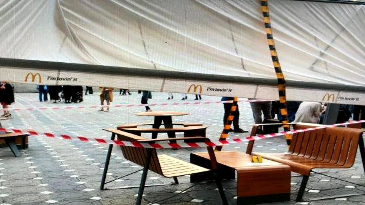 Român lovit în cap de o umbrelă de la McDonald's, bun de PLATĂ! A fost obligat să achite 2.000 de euro
