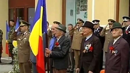 Un nou scandal în Covasna: Oprea cere sancțiuni după ce veteranii n-au putut arbora drapelul pe clădirea Primăriei Sf. Gheorghe