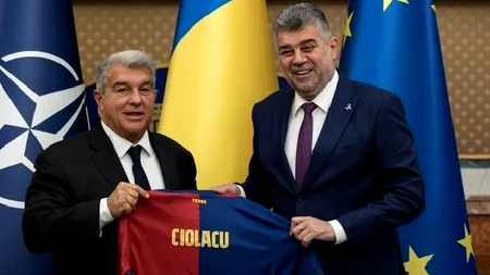 O ofertă de nerefuzat. Ciolacu, fan Real, a primit un tricou Barca de la președintele Laporta. Cum a fost posibil