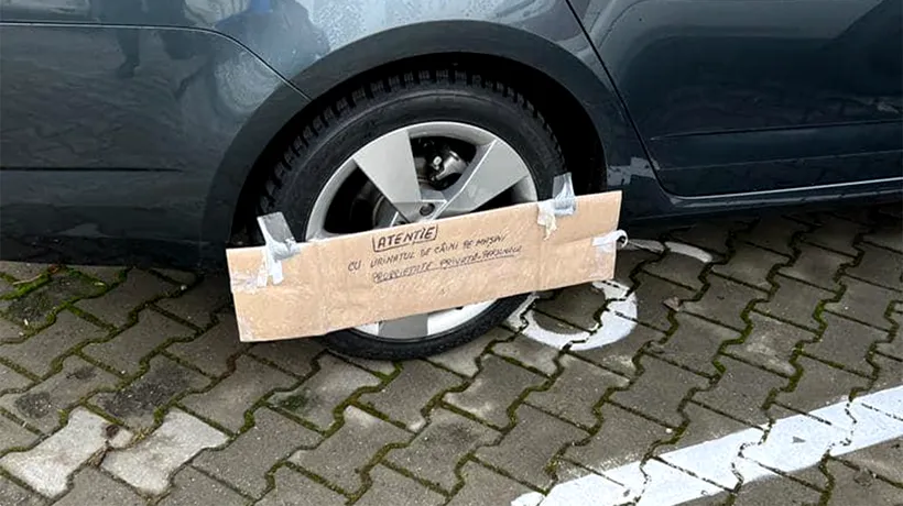 Râzi cu lacrimi! Ce mesaj absurd a scris un șofer clujean pe un carton fixat pe roata mașinii sale