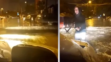 Imagini ȘOCANTE în Capitală! Un bărbat cu un târnăcop în mână încearcă să oprească un șofer care trece cu viteză printr-o zonă inundată