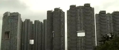 De ce au zgârie-norii din Hong Kong găuri mari în construcție