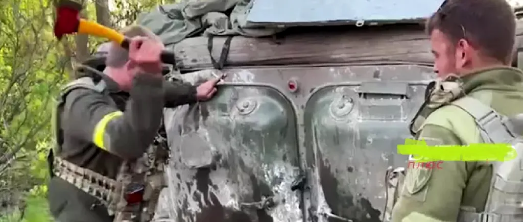 Un comandant rus lăudat la TV pentru „curajul” său și-a abandonat vehiculul de luptă. Ucrainenii l-au deschis cu toporișca. VIDEO