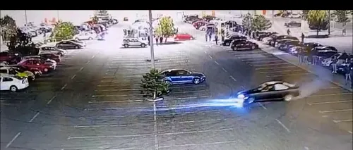 Bărbatul care făcea drifturi în parcarea unui mall, oprit cu focuri de armă, a fost reținut. Imaginile surprinse de camere. VIDEO