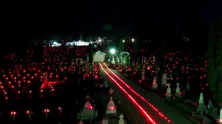 ANCHETĂ. Cimitirele din Râmnicu Vâlcea, luminate de Înviere cu 18.000 de lumânări. Poliția anchetează cazul