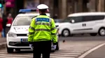 Caz ȘOCANT la o intersecție din București. Un șofer a călcat intenționat cu mașina un polițist local. Cum s-a întâmplat totul