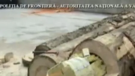 Peste 70.000 de pachete de țigări de contrabandă, ascunse în bușteni într-un tren de marfă