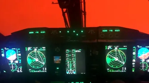 Imagini cutremurătoare, ca rupte din infern, surprinse din cabina unui avion care a intervenit în anihilarea incendiilor din Australia / Calvarul prin care trec piloții - VIDEO