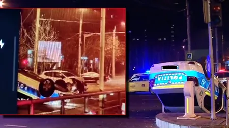Accident în București. O mașină de poliție, aflată în misiune, s-a răsturnat după ce s-a ciocnit cu un alt autoturism
