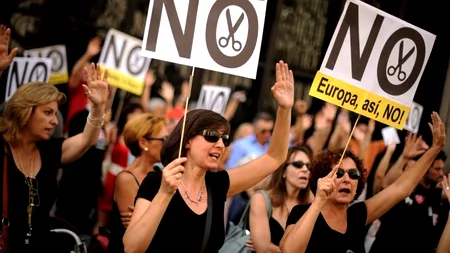 Spaniolii au ajuns să muncească fără să fie plătiți, dar nu renunță la job-uri