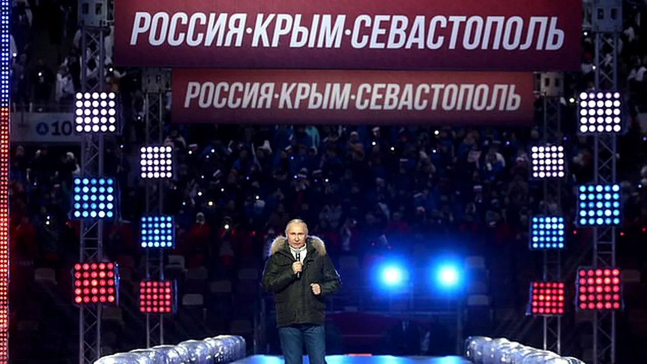 Vladimir Putin apare la concertul patriotic numit „Zilele Crimeei” după ce liderii G7 au condamnat „ocupația” rusă. Zeci de mii de oameni s-au adunat pe stadionul Luzhniki din Moscova