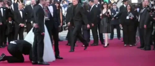 Autorul unor farse celebre, arestat după ce a încercat să se ascundă sub rochia unei vedete care poza pe covorul roșu de la Cannes