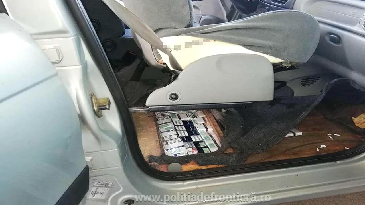 Aproape 3.000 de pachete cu țigări, ascunse în podeaua unei mașini, au fost confiscate