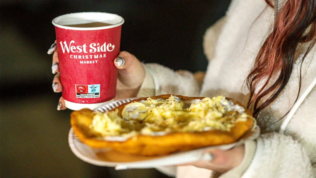 Cât a dat această bucureșteancă pentru un langoș și un vin fiert, la Târgul de Crăciun 2026 din Drumul Taberei