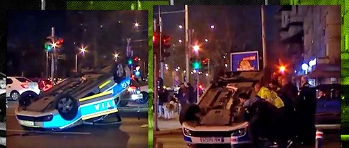 VIDEO | Un polițist aflat în misiune a izbit un taxi, într-o intersecție din București. În urma impactului, mașina agentului s-a răsturnat