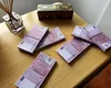 DESCOPERIRE spectaculoasă în Vrancea! Cum au găsit polițiștii peste 20.000 de bancnote false / Trei dosare penale deschise