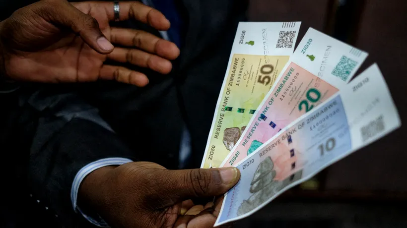 Țara cu bancnote de 100.000.000.000.000 de dolari a adoptat o nouă MONEDĂ. Despre ce e vorba și cum va funcționa