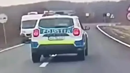 VIDEO| Camera de bord a surprins o mașină de Poliție care face o depășire periculoasă cu o viteză dublă față de cea legală