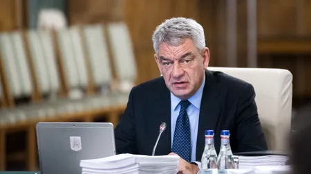 Un bancher vrea să-l convingă pe premierul Tudose să-și facă card