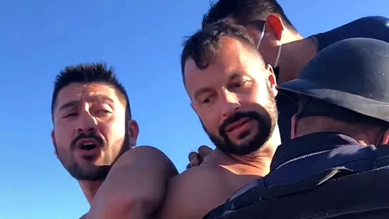 Doi bărbați gay au fost încătușați după ce s-au sărutat în public! Ce s-a întâmplat după - FOTO/VIDEO