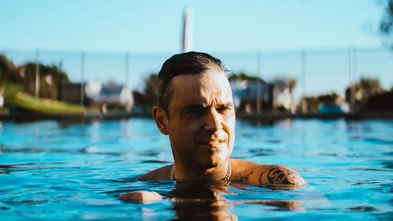 Caz neobișnuit: Robbie Williams și-a angajat gărzi de corp care să îl apere de... extratereștri