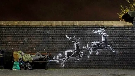 Celebrul artist în graffiti, Bansky, surprinde din nou cu o creație care emoționează până la lacrimi: Statutul oamenilor fără adăpost de Sărbători - VIDEO 