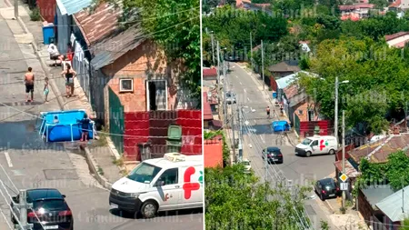 Imaginile zilei, surprinse în București. În plină caniculă, o familie si-a facut piscină pe trotuar, în fața casei
