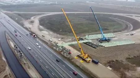 Autostrada București Sud: Aktor a început montarea grinzilor pasajului de la nodul dintre A0 și A1