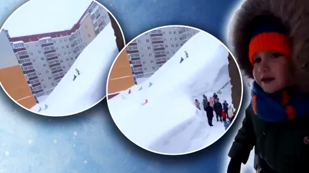 (Video) Munții de zăpadă dintre blocurile din Kamceatka au fost transformați de copiii ruși în derdeluș. Imagini care par create de inteligența artificială