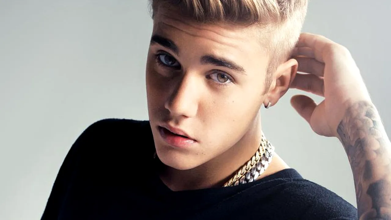 Motivul pentru care Justin Bieber a fost dat în judecată de un fotograf