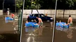Străzile inundate ale Capitalei au devenit loc de joacă. Un grup de tineri a ieșit la plimbare cu o piscină gonflabilă. Imaginile s-au viralizat imediat