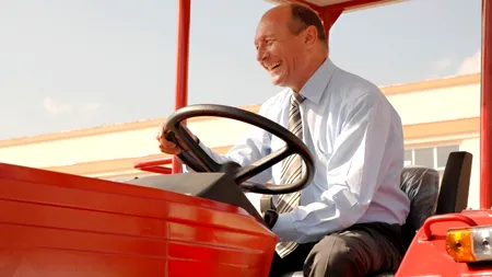 Legea prin care străinii pot cumpăra teren agricol în România, trimisă de Băsescu la reexaminare