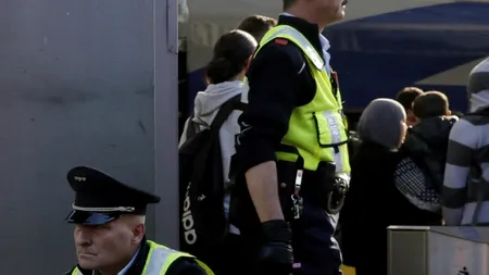 Români care pretindeau că erau polițiști pentru a jefui turiști, arestați la Viena 