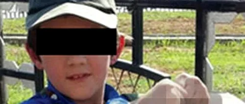 Un australian a postat pe Twitter o poză cu fiul său minor arătând capul unui militar sirian
