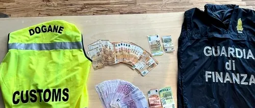 Un român a fost prins cu 23.000 de euro nedeclarați pe un aeroport din Italia. Ce se va întâmpla cu banii