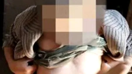 Caz cutremurător: Băiețel de 6 ani, pedepsit de proprii părinți prin înlănțuire - FOTO 