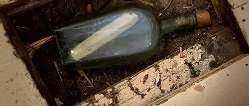 Un mesaj vechi de 135 de ani a fost ascuns într-o sticlă de whisky și găsit sub podeaua unei case. Incredibil ce scria în bilet