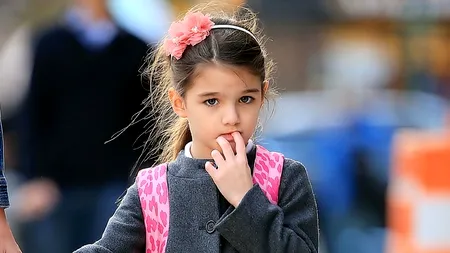 Suri Cruise, agresată verbal de un fotograf