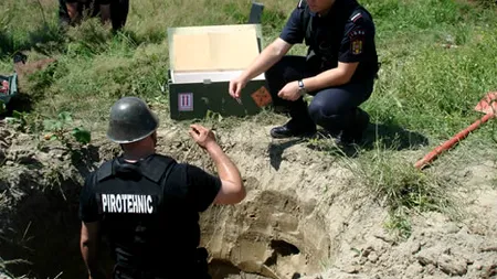 Un proiectil de război a explodat într-o pădure din Bacău. Trei muncitori încercau să-l taie cu drujba