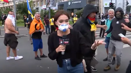 VIDEO | Echipa Realitatea TV, agresată la manifestațiile din Piața Victoriei. Protestatari cu fața acoperită au încercat să-i smulgă microfonul din mână reporterului. Ar fi ajuns la spital