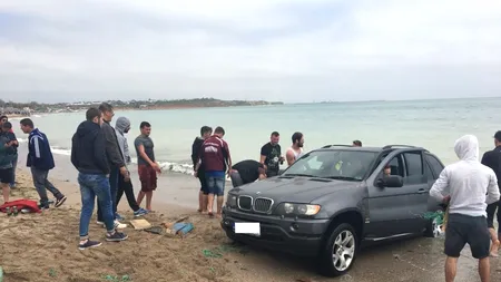 A fost identificat șmecherul care și-a băgat BMW-ul în apa mării la Vama Veche. De unde este și ce amendă a primit
