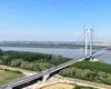 CNAIR câștigă definitiv procesul privind întârzierile la Podul de la Brăila