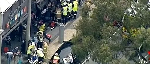 Un individ a incendiat o sucursală bancară din Australia. 26 de oameni au fost răniți. VIDEO