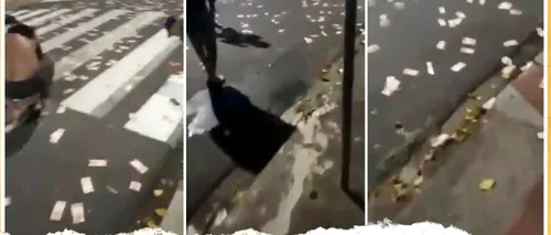 „Ploaie de bani” pe o stradă din Alexandria. Cum a ajuns o sacoșă plină cu bancnote pe capota unei mașini