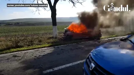 GÂNDUL LIVE. Mașină înghițită de flăcări la Tulcea! Șoferița, salvată în ultima clipă de martorii accidentului