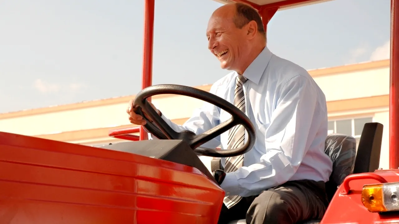 Legea prin care străinii pot cumpăra teren agricol în România, trimisă de Băsescu la reexaminare